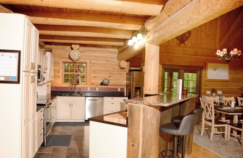 Brimley Cabin | Beautiful log cabin in the woods with a hot tub. 5 min walk to a quiet beach.