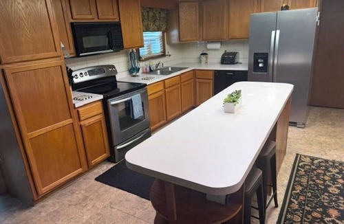 Astor Cottage | Beautiful Water Front Astor Cottage w Pool, Hot tub, Huge Deck & Wifi