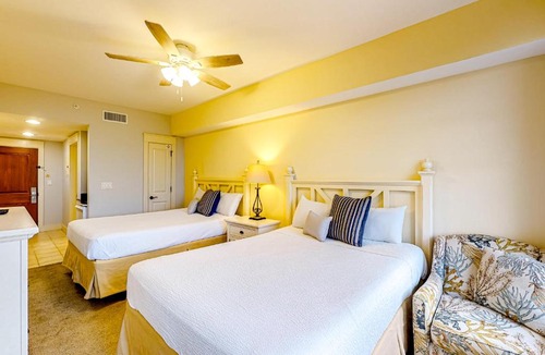 Baytowne Wharf Apartment | Bright & cozy coastal condo with shared pools hot tubs fast WiFi & central AC