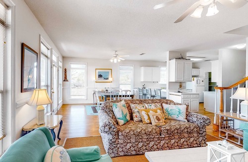 Audubon Place Condo | Bright duplex with two full kitchens, large decks, and private washer/dryers