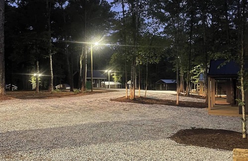 Hartwell RV Rental | Cabin #5: One bedroom with full kitchen and a large gravel parking pad beside the cabin for easy boat or trailer storage.