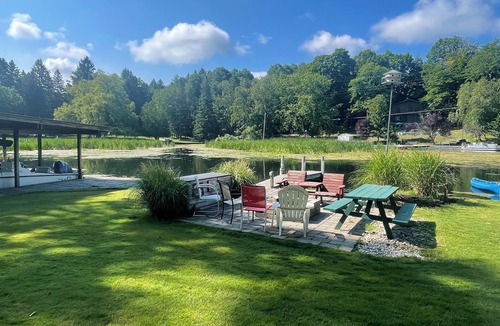Ludington Cottage | Castle Point Resort on Hamlin Lake . Home, cottages, boat 650 ' Lake frontage