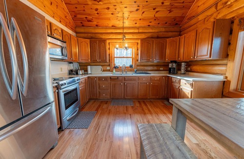 Gould City Cabin | Cedars on South: Lakeside Living – Kayaks, Dock, and Stunning Views!