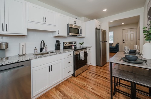 Civil Rights Historic District Condo | Central Duo Suites - Big Groups/Parking/Queen Beds