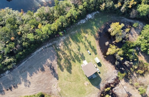 Lucedale Cabin | Charming 3-bedroom cabin with WiFi, AC on Escatawpa River in Lucedale MS