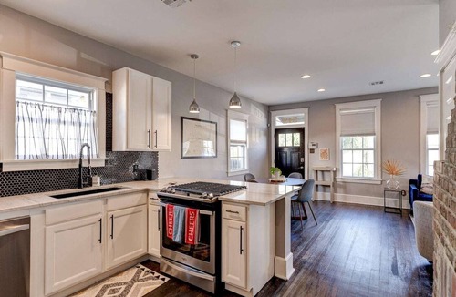 West Riverside House | Charming 3BR Uptown home with fenced yard. Walk to Magazine St, near streetcar & FQ.