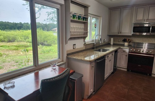 Mount Dora House | Charming lakefront 3BR 3BA house w/EV chg in heart of Mt. Dora. Nature abounds.