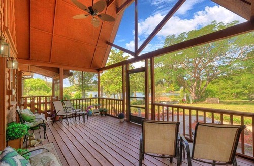 Lake Helen House | Charming Lakefront Room with Private Porch & Canoe Rentals Near Lake Helen, Florida