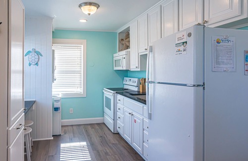 Gulf Shores Cottage | Chic 2BR Getaway with Pool & Balcony Just Steps from the Sand