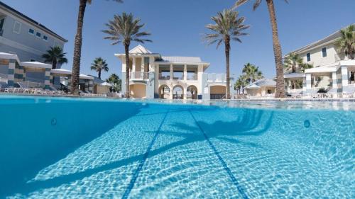 Palm Coast House | Coastal Breeze Luxurious Coastal Villa Steps to Cinnamon Beach Beautiful Pools! Perfect for Families