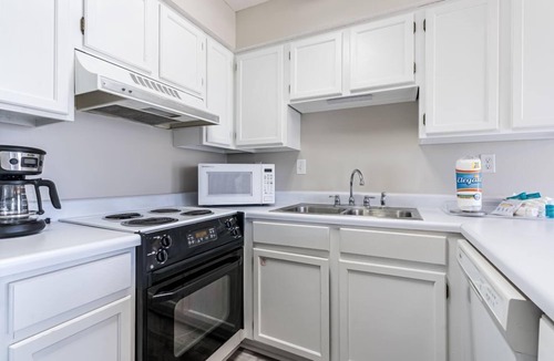 Gulf Shores Condo | Condo in Gulf Shores w/Pool, Grills, & Lagoon Front Fishing Pier | Sleeps 4