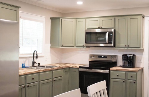 Eastman House | Cozy 2-bedroom house nestled among the trees and surrounded by open space.