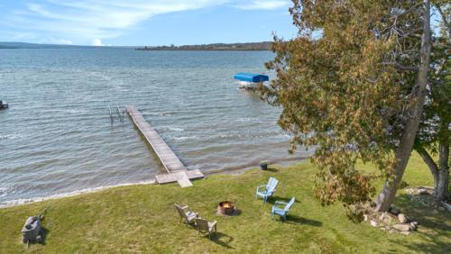 Traverse City House | Cozy A Frame Waterfront Chalet Dock Fireplace
