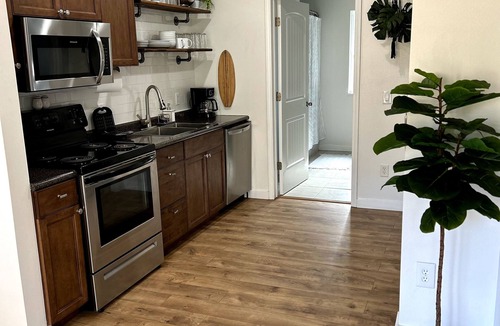 Theodore House | Cozy coastal oasis w/wooded views and wrap around deck. Close to Dauphin Island