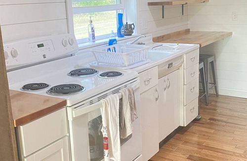 Mayfield House | Cozy Farmhouse on 120 acres- minutes from Traverse City, water, ski, ATV trails