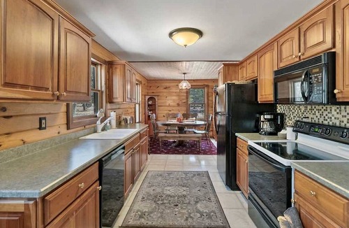 Manistee Cabin | Cozy Forest Cabin with Fireplace Near Lake Michigan Beaches in Manistee, Michigan