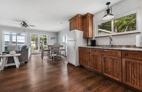 Kalkaska Cottage | Cozy Private Lakefront Cottage, Pet-Friendly with Private Dock