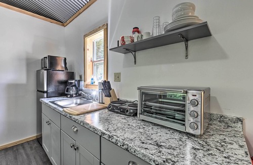 East Tallassee Cabin | Creekside Cabin Retreat w/Community Fire Pit