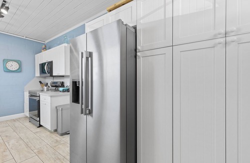 New Smyrna Beach House | Direct Oceanfront, Pet Friendly, Veranda and Front Porch Beach House on Hill Str
