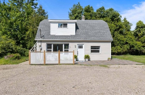 Douglas House | Discover comfort at Pine Cove, a cozy 1-bedroom retreat in scenic Douglas, MI.