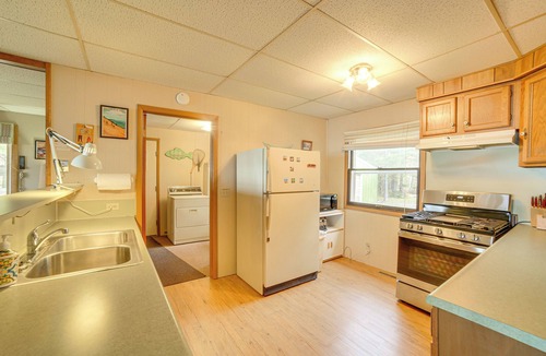 Gould City Cottage | Dock & Fire Pit: Lakefront Cottage in Gould City!