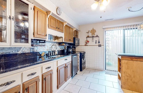 Perdido Bay Villas Condo | Dog-friendly coastal townhome with golf course views, patios, & washer/dryer