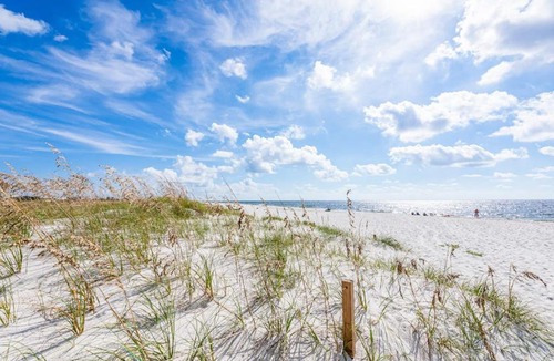 Perdido Bay Villas House | Dog friendly coastal townhome with golf course views patios and washer dryer