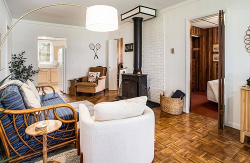 Lake Michigan Beach Cottage | Dog-friendly cottage with a large yard, firepit, grill, & wood-burning fireplace