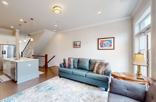 Hitch Village - Fred Wessels Homes House | Dog-friendly townhouse with modern kitchen, balcony, garden tub, & central AC