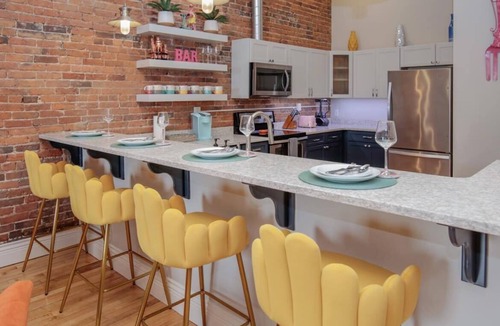 Central Business District Apartment | Downtown Luxury Industrial Loft/13-Ft Ceilings/Walkable