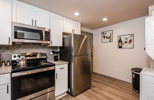 Browns Mill Park House | Dreamy Downstairs Unit of Guest Home with Private Patio, BBQ Area & Yard Games!