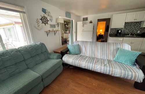 Au Gres House | Enjoy a Lake Huron view less than a minute walk to the beautiful sandy beach.