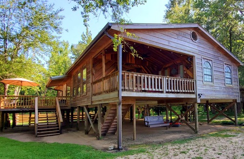 Lucedale Cabin | Escape City Life at this Exceptional Cabin Retreat with River Views.