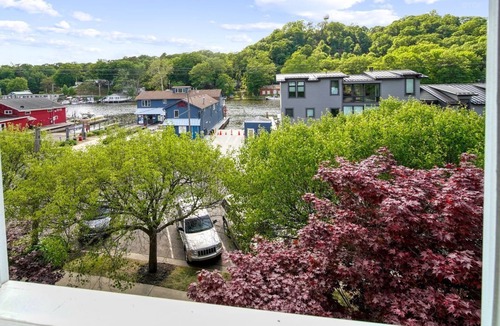 Saugatuck Condo | Experience comfort in this 3-bedroom townhome with stunning water views in downtown Saugatuck.