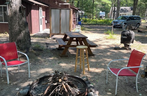 Rapid City Cottage | Family FUN: Torch Lake Cottage with Private Beach Access - Kayaks & SUP Provided