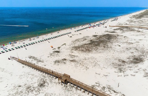 Fort Morgan Condo | Fantastic Coastal Escape W/ Beach Access, Shared Pools/Hot Tubs, Fast WIFi & AC!