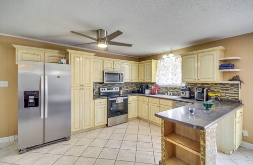 Carriere House | Fenced-In Yard + Patio: Pet-Friendly Carriere Home