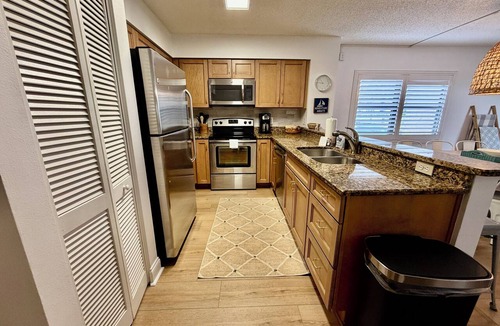 Butler Beach Condo | FREE FUN during your stay in this Gold-rated condo with beautiful ocean view and easy access to the pool and beach!