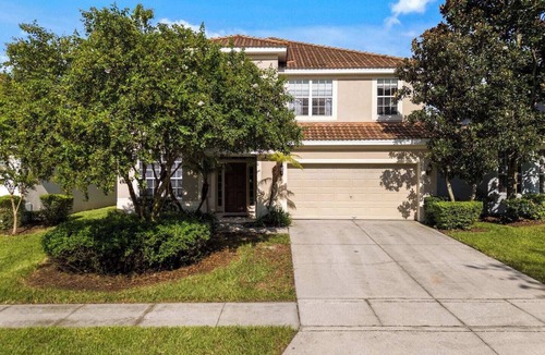 Windsor Hills House | Fully themed 6BR home just 3 miles from Disney. Kids love the Princess & Dragon rooms and epic arcade game room, while adults relax by the private pool & spa. Located in Windsor Hills Resort with water park, slides & top amenities. Sleeps 14.