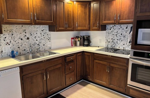 Empire House | Great Glen Arbor location! Private wooded setting, quick walk to town! Sleeps 9