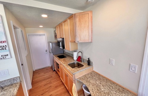 South Peninsula Historic District Condo | Ground Level Corner Unit with Windows Both on Gulf/pool