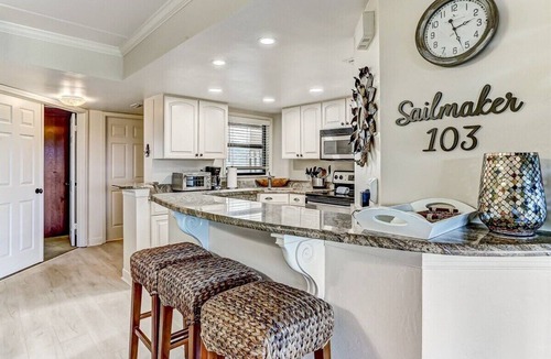 Amelia City Condo | Ground level, patio walkout - Oceanfront condo with gorgeous interior & Pool!