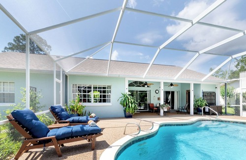 Palm Harbor House | Heated Saltwater Pool, Sauna and Billiards