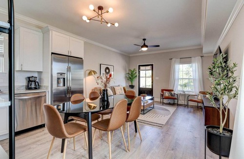 Tulane - Gravier Apartment | Historic 3BR Mid-City home by Lafitte Greenway. Sleeps 6, patio, Wi-Fi, Smart TVs, walk to Superdome