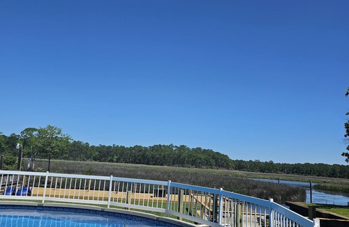 Gautier House | HotTub/Fish/RIVER FRONT/DOGS/SUMMER POOL.RIGHT BY GULF AND BEACHES. BRING BOAT!