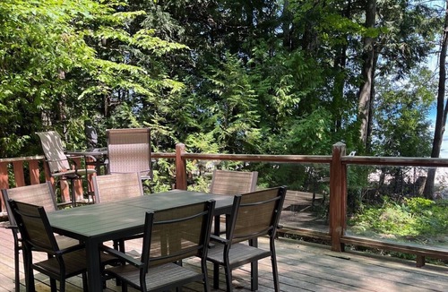 Traverse City House | House on sandy beach in Omena. Budget friendly. Dog ok. Sunrise views.