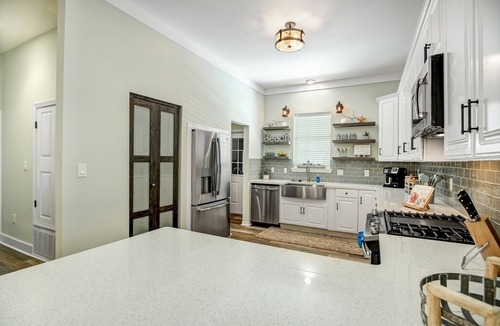 Sugarwood Beach House | Huge heated pool Close to beach and Seaside, 6 seat Gem car, pet friendly