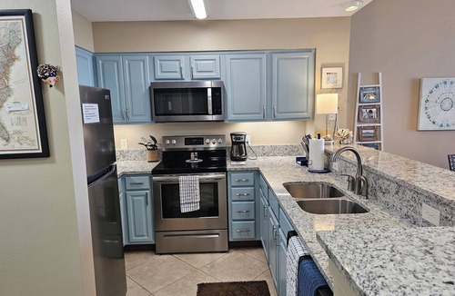 Dauphin Island Condo | Inn at Dauphin Island 110-Walk-in Shower! Walk out to Pools and Beach!
