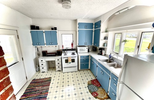 East Jordan House | Ironton Shore Farms: 4 Bedroom Farmhouse on Lake Charlevoix with Beach and dock