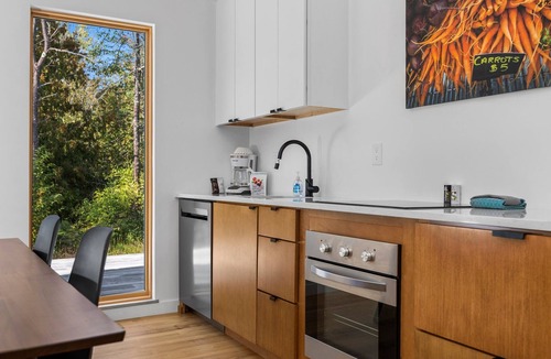 Acme Cabin | KOTI 11 (Two Bedroom) Traverse City's Scandinavian Cabins, vacation home on TART & mins to Traverse .